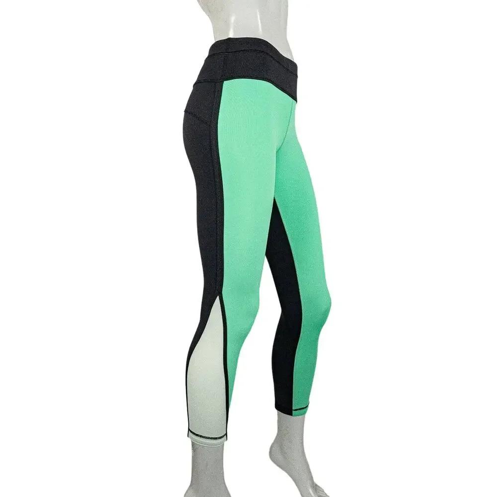 Lululemon two tone Green Black Leggings mesh side size 4